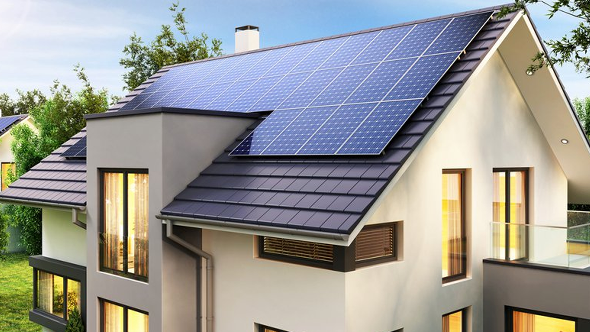 Solar panels on a roof at sunset